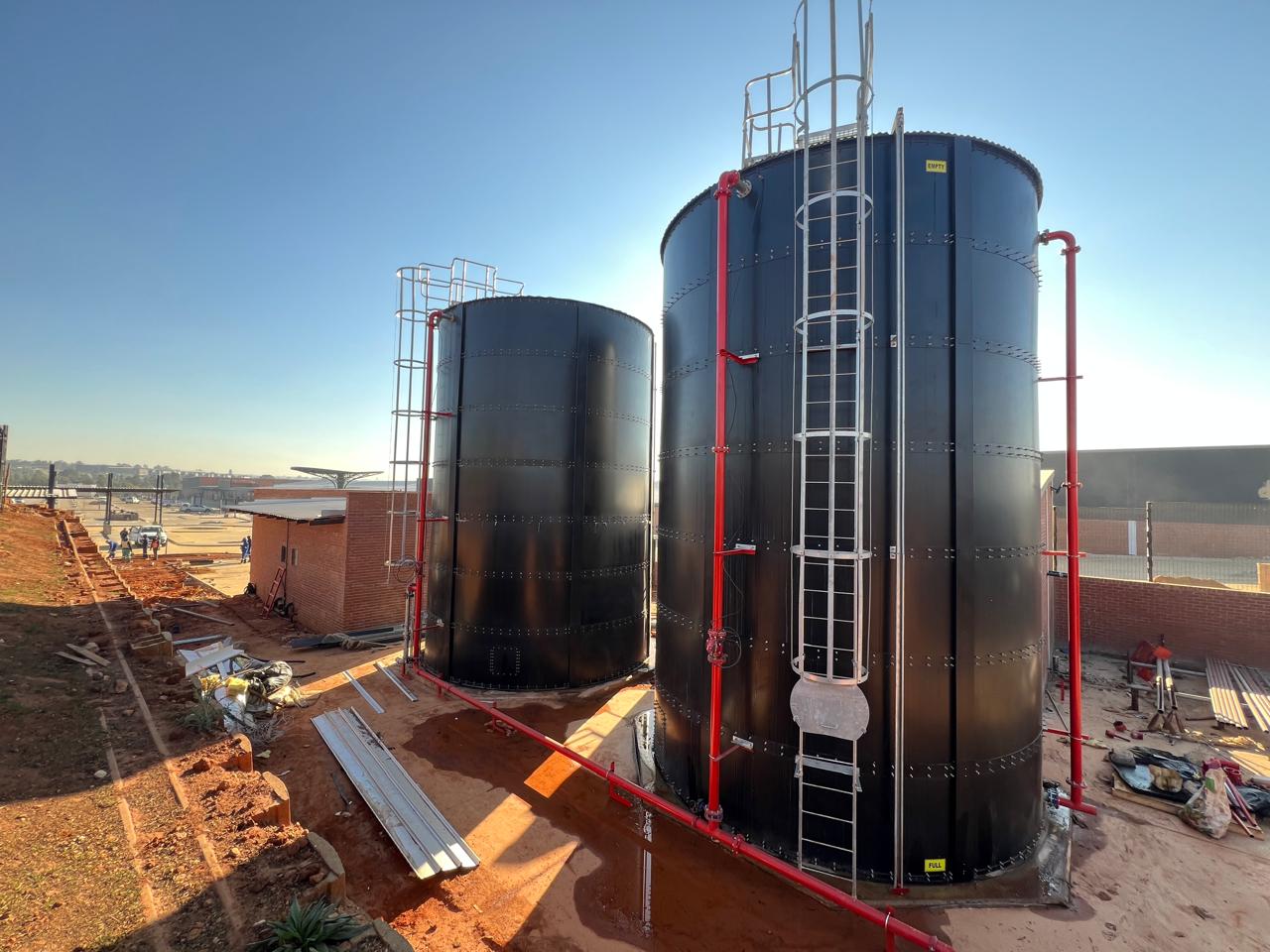 Videx cylindrical steel water tanks with outlet pipework at Fleurhof Mall