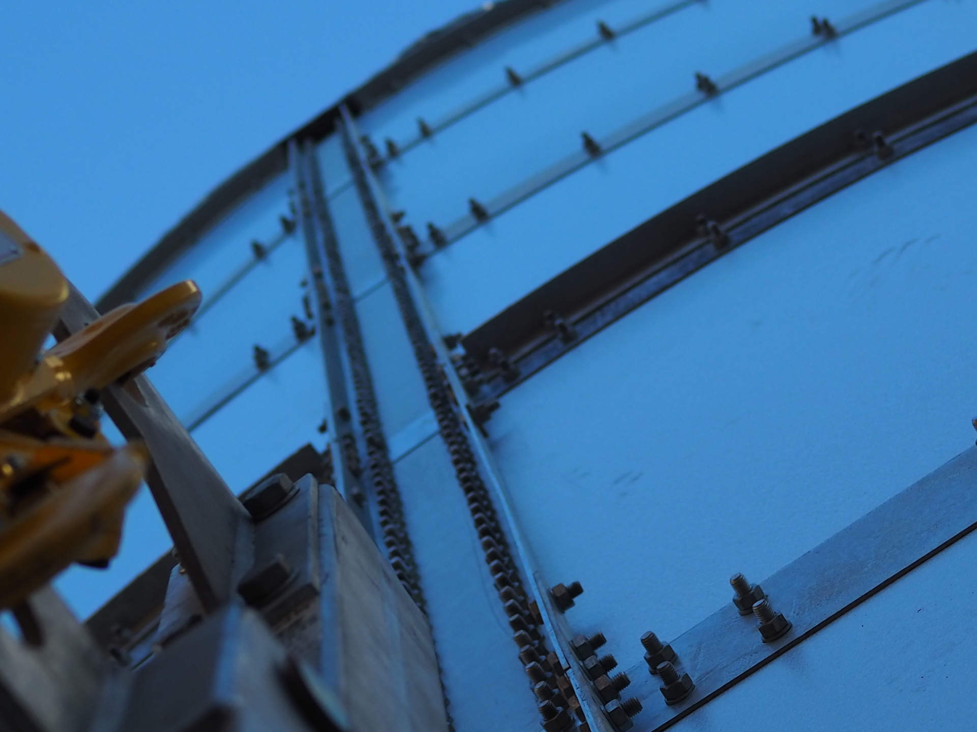 Close-up of tank ladder and steel panel connections